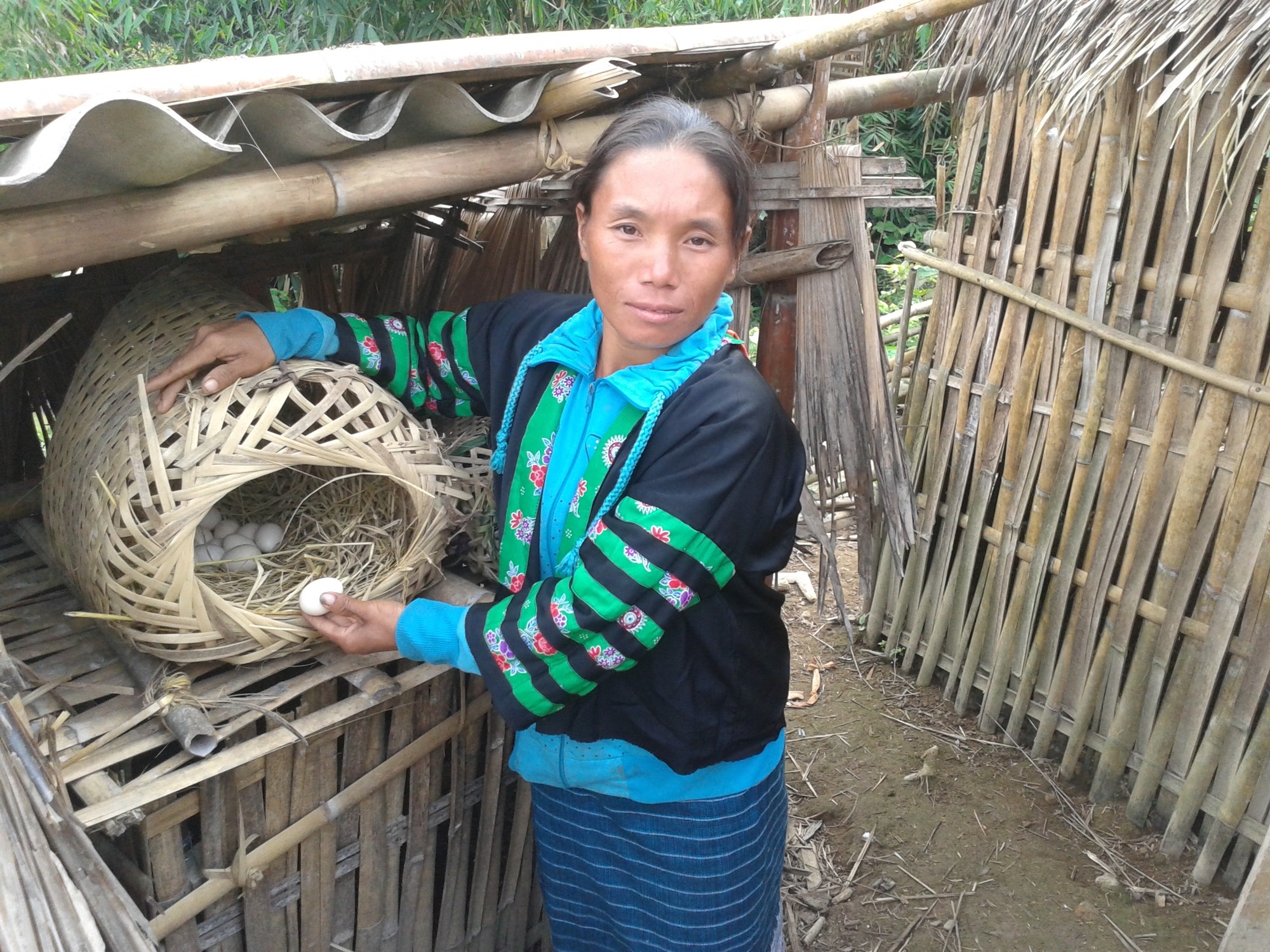 A woman holding eggs